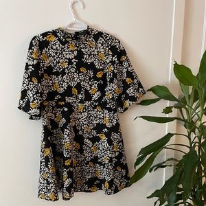 Black floral dress with flare